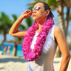 The Pink Splash Lei is a distinctive and stunning floral accessory made from fresh white orchids with a soft pink splash on each petal. This double strand lei is perfect for weddings, graduations, and tropical celebrations. The unique combination of colors creates an elegant and vibrant look, making this lei a perfect addition to any special occasion. Handcrafted with the finest orchids for lasting beauty and elegance.