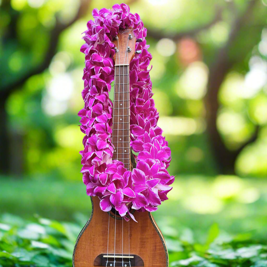 The Pink Splash Lei features fresh white orchids with a pink splash on the petals, offering a unique and artistic floral design. This double strand lei is perfect for beach weddings, graduations, and tropical parties. The combination of the white and pink orchids creates a striking contrast that adds elegance and beauty to any event. Handcrafted with care, this lei is the ideal accessory for any celebration.