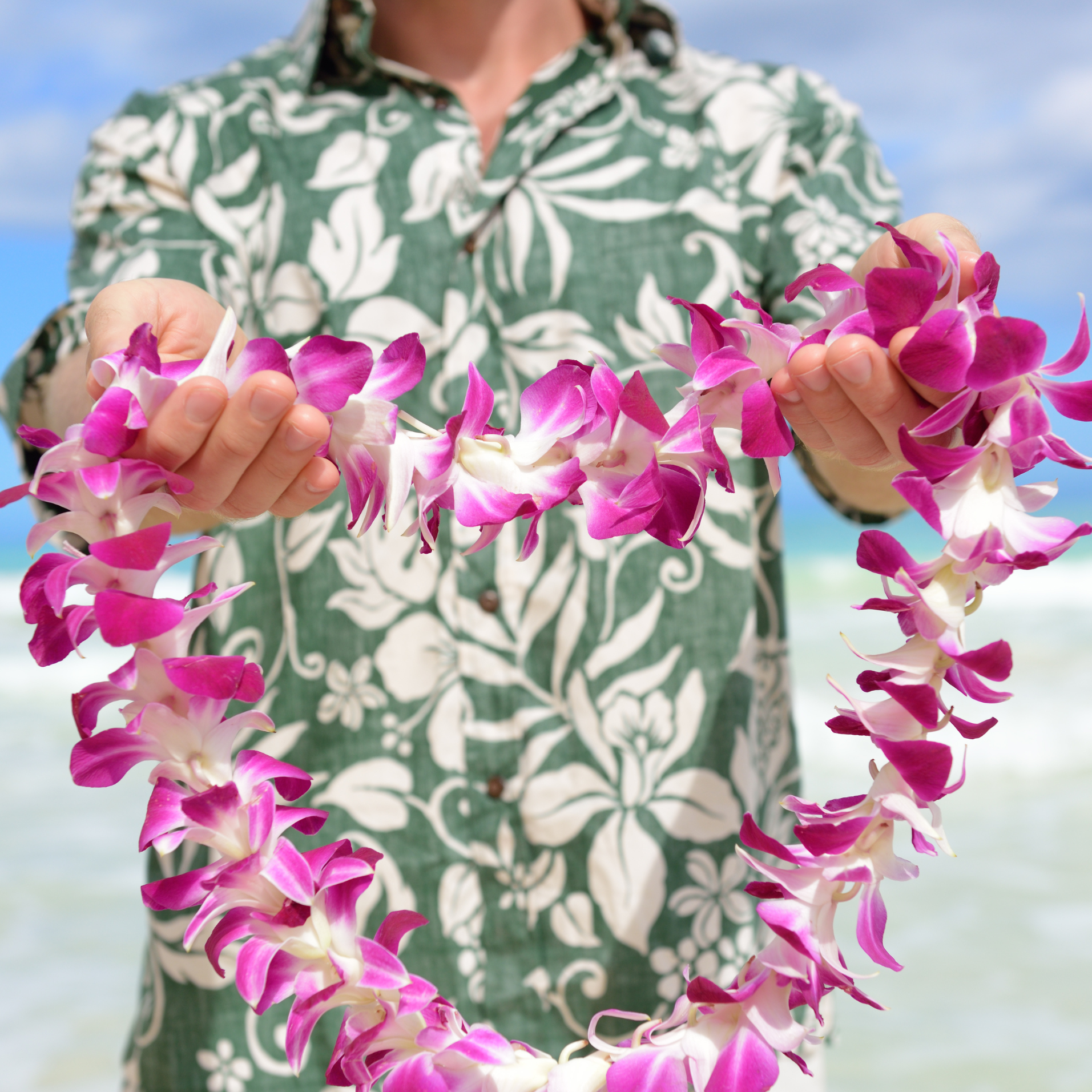 Single Purple Orchid Lei crafted with 55 vibrant Dendrobium orchids. Freshly flown from Thailand, this lei is perfect for weddings, tropical parties, and events, offering a striking and elegant floral design.