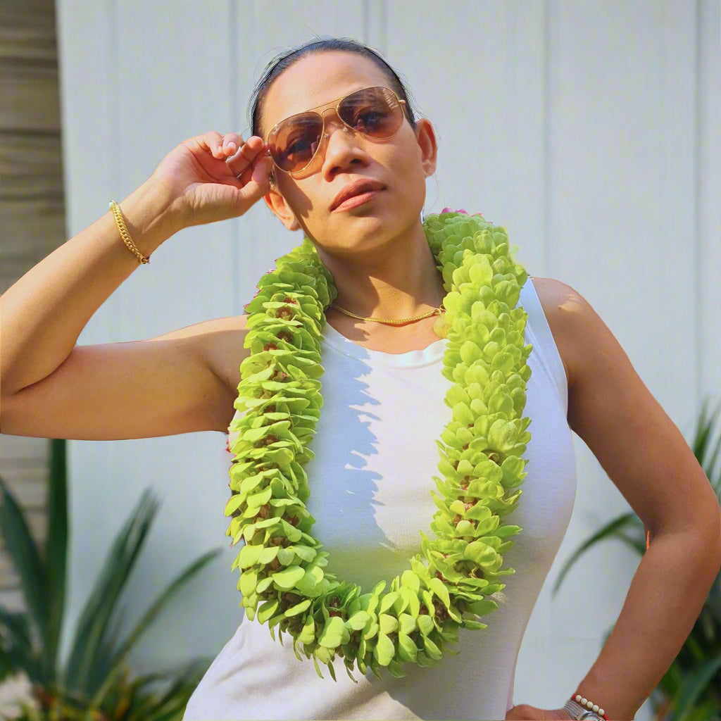 Jade Serenity – Double-Strand Green Orchid Lei. Handmade tropical lei for graduations, Hawaiian luaus, weddings & beach celebrations. Fresh flowers flown from Thailand. A bold, vibrant, elegant floral necklace for any tropical event.