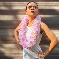 The Pink Blush Lei is a double orchid lei made from 100+ fresh pink and white orchids. This lush floral lei is perfect for weddings, graduations, tropical events, and Hawaiian-themed celebrations. Handcrafted with high-quality blooms, this elegant lei is flown fresh from Thailand, ensuring a luxurious and long-lasting floral accessory for your special occasion.