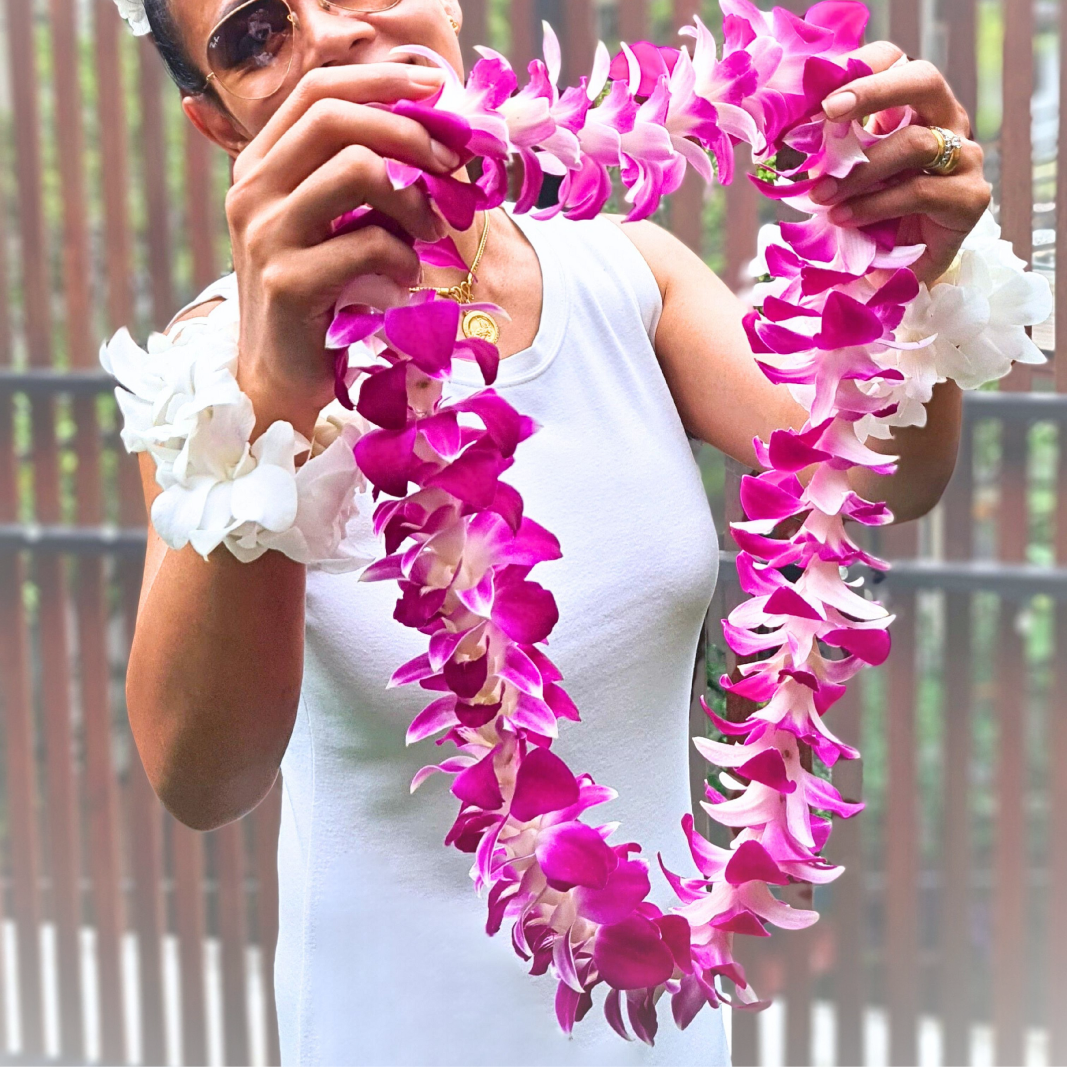 Gorgeous Single Purple Orchid Lei with 55 high-quality Dendrobium blooms. Freshly sourced from Thailand, this lei is perfect for tropical events, weddings, and graduations, offering a vibrant and unique look.