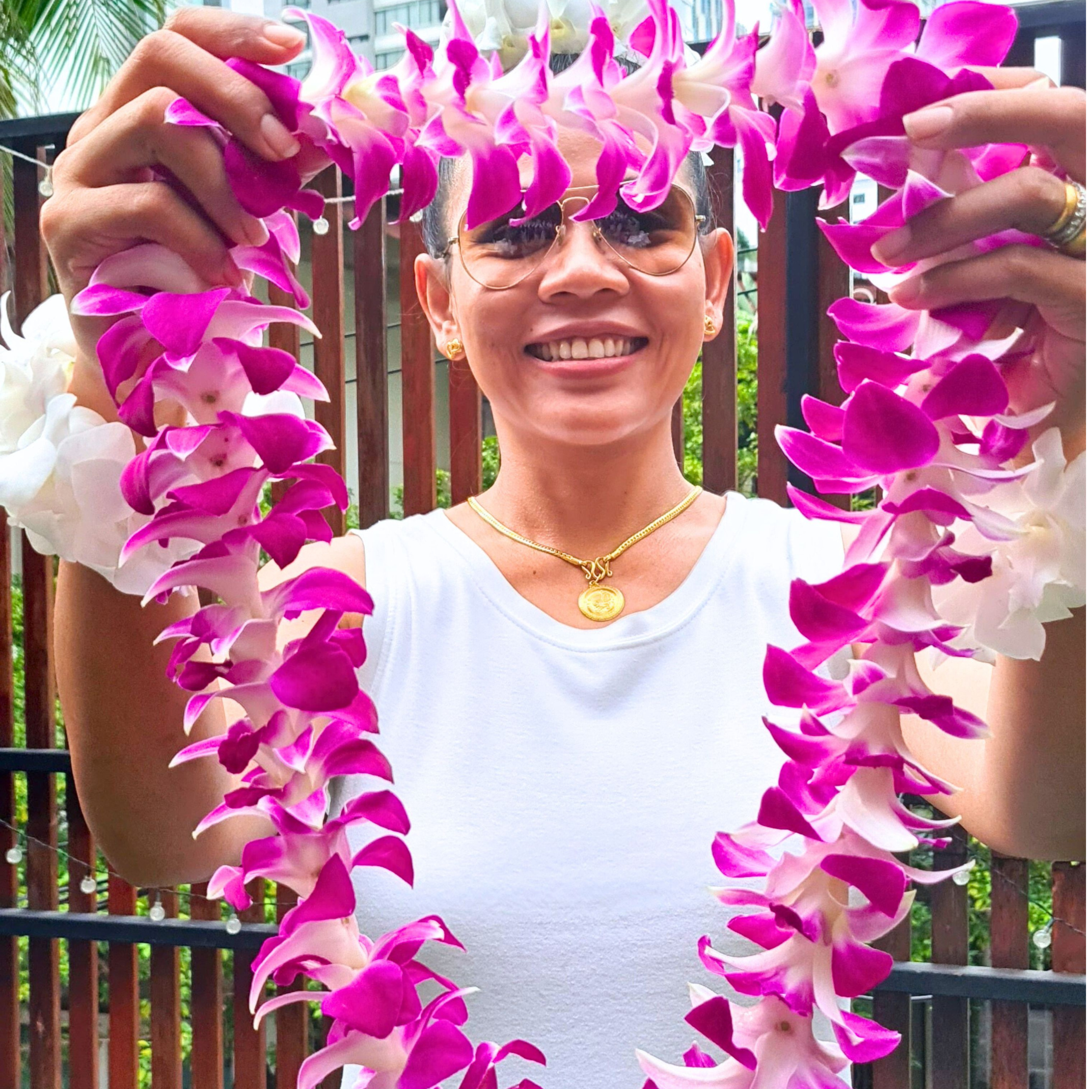 Premium Single Purple Orchid Lei featuring 55 fresh Thai Dendrobium orchids. Ideal for beach parties, graduations, and special occasions, this lei delivers a beautiful and lasting floral accessory.