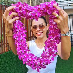 Handcrafted with precision, the Pink Splash Lei features white orchids with a pink splash, creating a delicate and artistic floral design. Perfect for beach weddings, graduations, and tropical galas, this double strand lei offers a fuller, more vibrant look. The combination of colors creates a striking and romantic accessory for those looking to add elegance and charm to their special day.